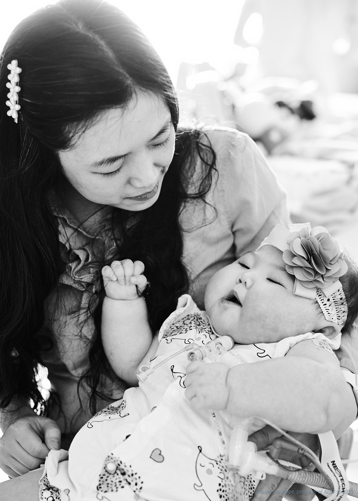 Black and white of Mommy holding Constance.